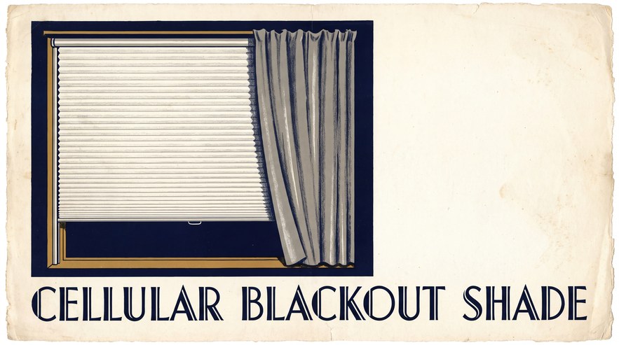 A bedroom window covered by a lowered white honeycomb shade held in narrow metal channels on each side, with a gray curtain pulled halfway across the glass.